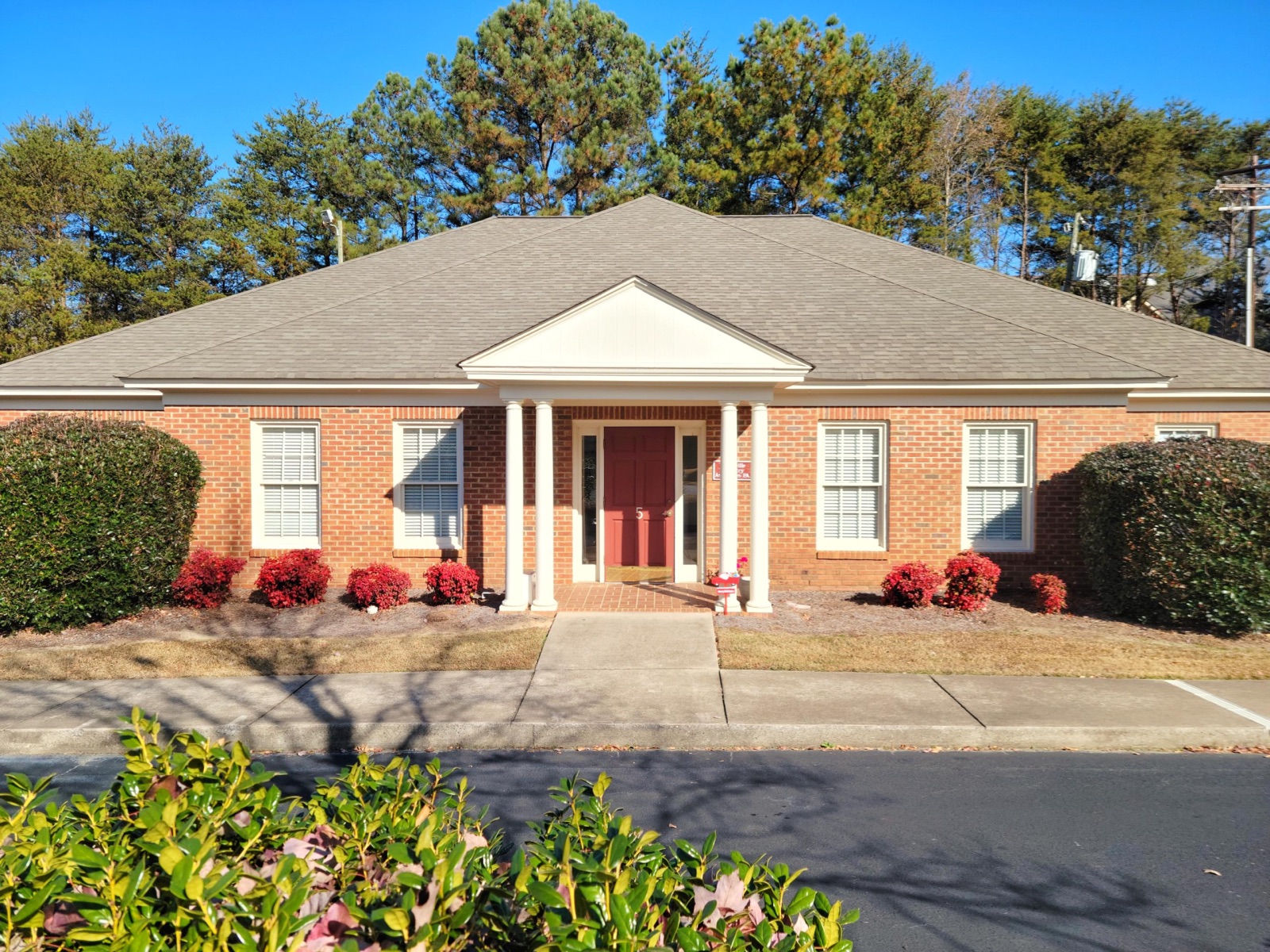The Greenville Podiatry Associates office — a brick building with white columns at 5 Arborland Way, Greenville, SC